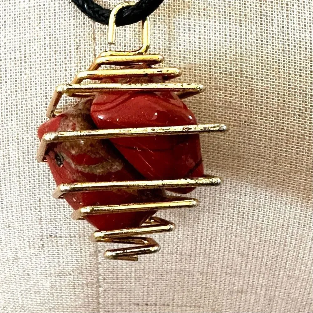 Red jasper gold tone caged pendant necklace
